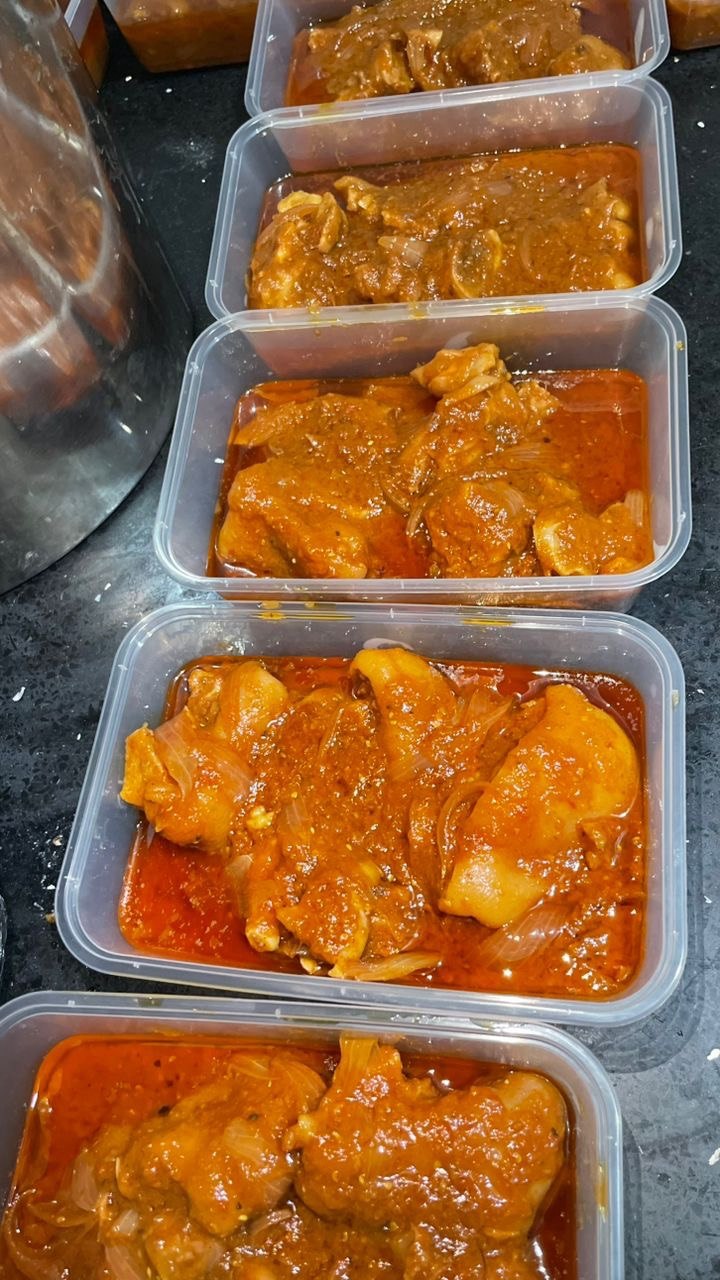 Pack of pork stew with a side of banku